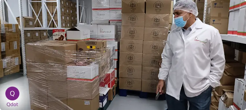 Halal compliance inspection in a warehouse, reviewing packaged products, storage conditions, and handling practices